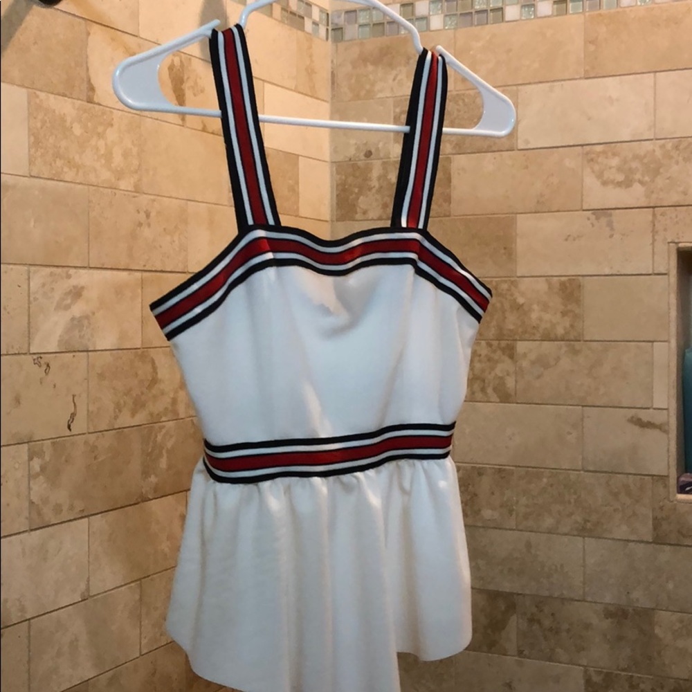 White tank top with red and blue accents